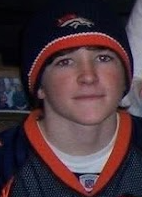 Aaron wearing a Denver Broncos hat